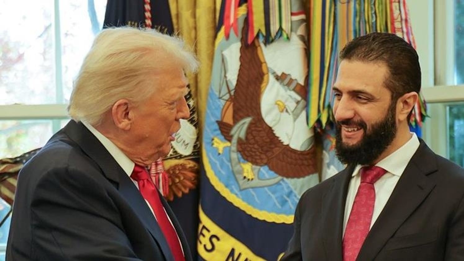 Syria’s interim president, Ahmad al-Sharaa, meeting with Donald Trump in Washington